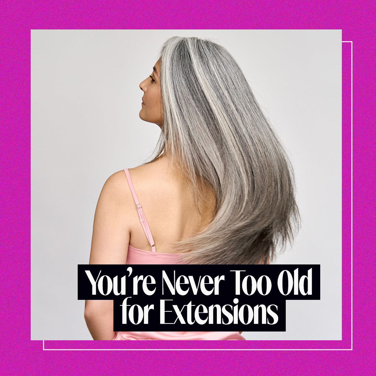 Older woman with grey hair swinging her hair